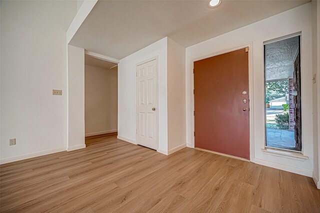 2810 Pineleaf Dr, Sugar Land, TX 77479 - entryway with light wood-type flooring and baseboards