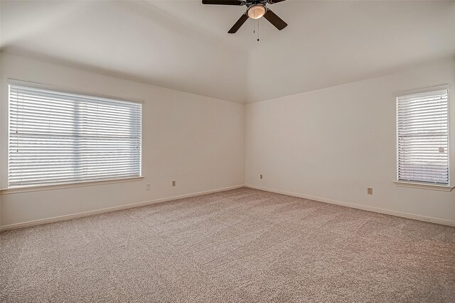 2810 Pineleaf Dr, Sugar Land, TX 77479 - unfurnished room with ceiling fan, light carpet, vaulted ceiling, and baseboards