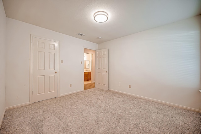 2810 Pineleaf Dr, Sugar Land, TX 77479 - unfurnished bedroom with light colored carpet and baseboards