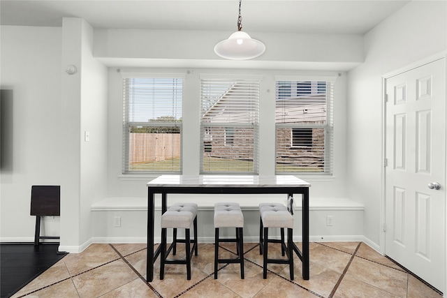 tiled dining area with breakfast area