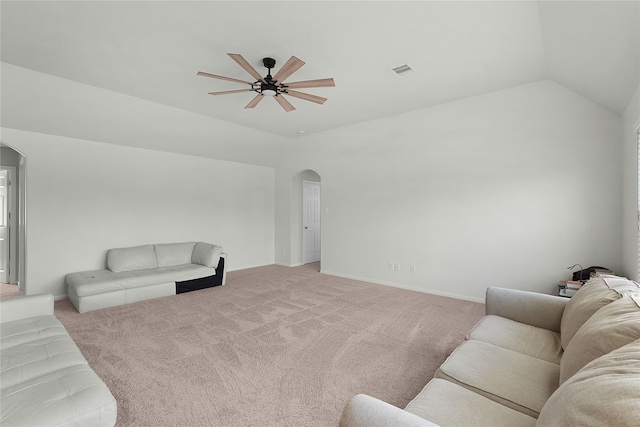 living room featuring ceiling fan, light colored carpet, and lofted ceiling