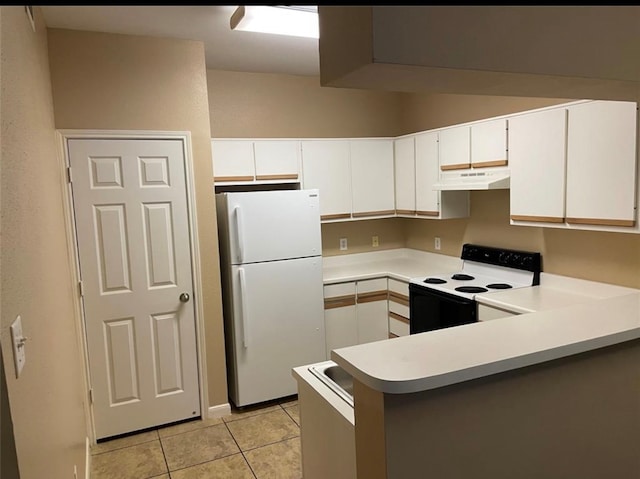 kitchen featuring white appliances, light tile patterned floors, kitchen peninsula, and white cabinetry