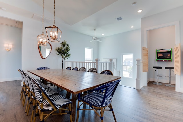 dining room featuring hardwood / wood-style floors and ceiling fan