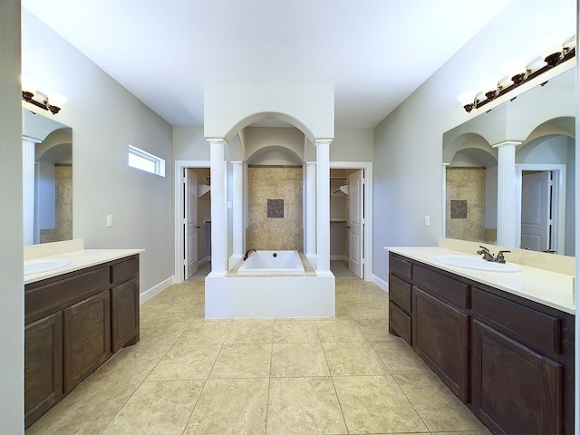 bathroom with vanity, ornate columns, tile patterned floors, and independent shower and bath