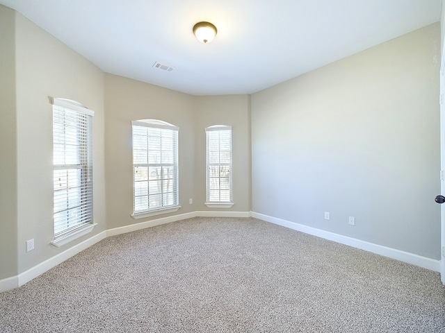 view of carpeted spare room