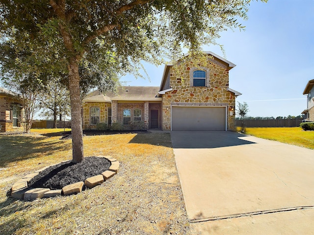 view of front of house with a garage and a front lawn