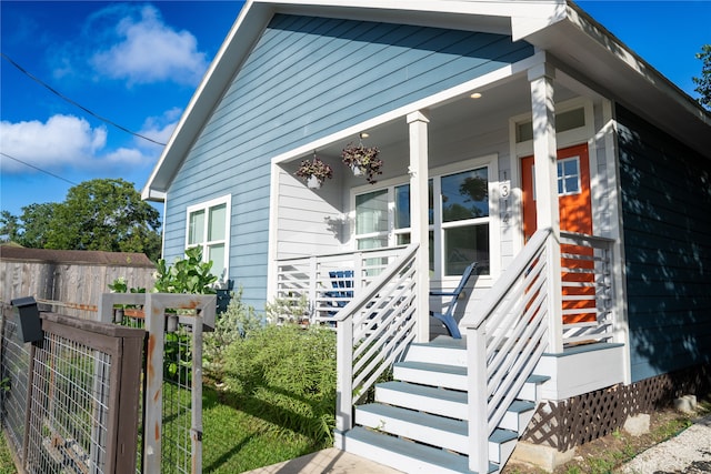 view of front of home featuring covered porch