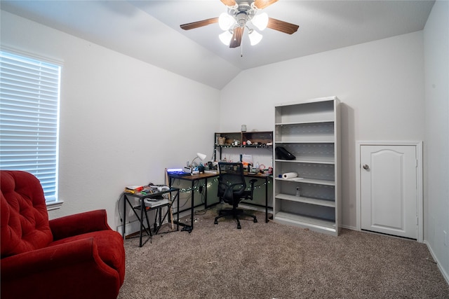 office space featuring ceiling fan, lofted ceiling, and carpet flooring