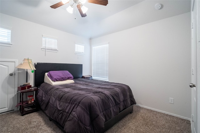 bedroom featuring ceiling fan and carpet floors