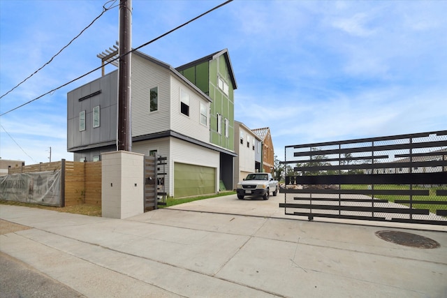 view of side of home featuring a garage