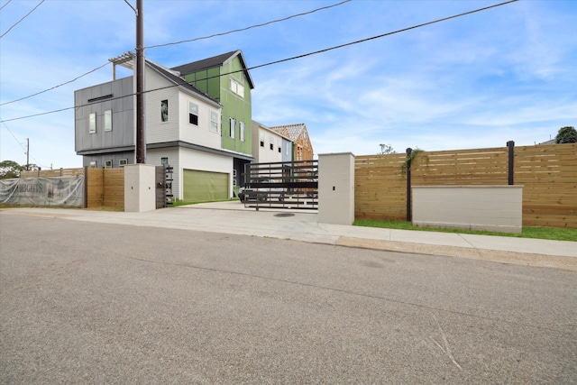 view of side of property with a garage