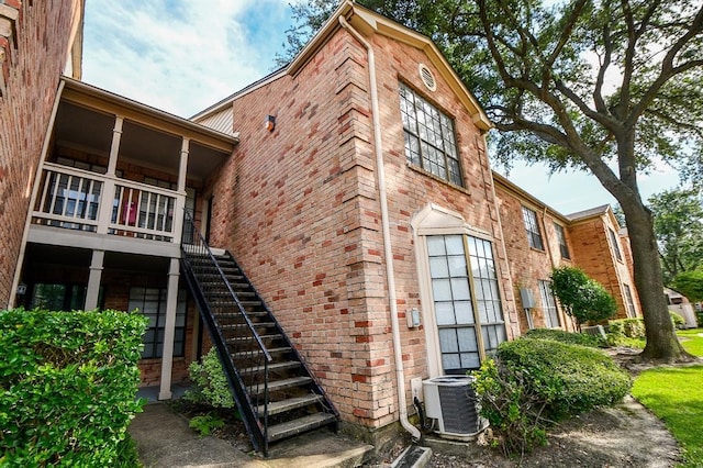 view of property with central air condition unit