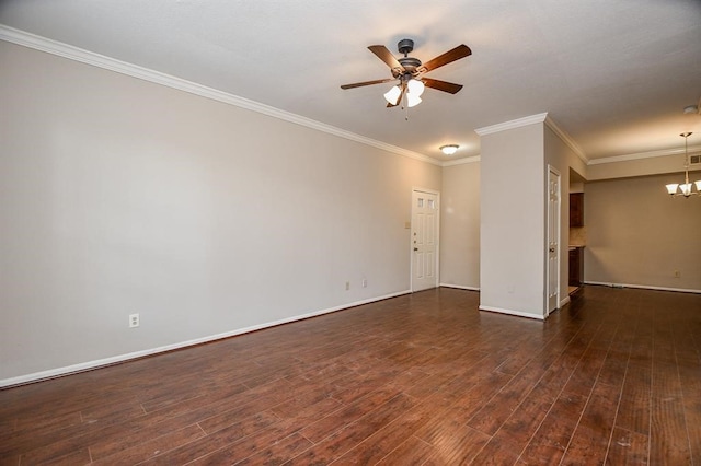 empty room featuring dark wood-type flooring, crown molding, and ceiling fan with notable chandelier