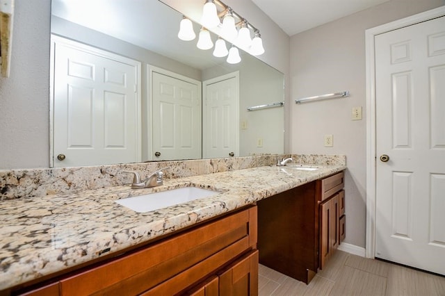 bathroom with vanity and tile patterned floors