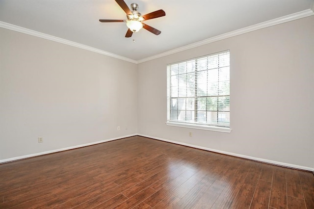 spare room with crown molding, dark hardwood / wood-style flooring, and ceiling fan