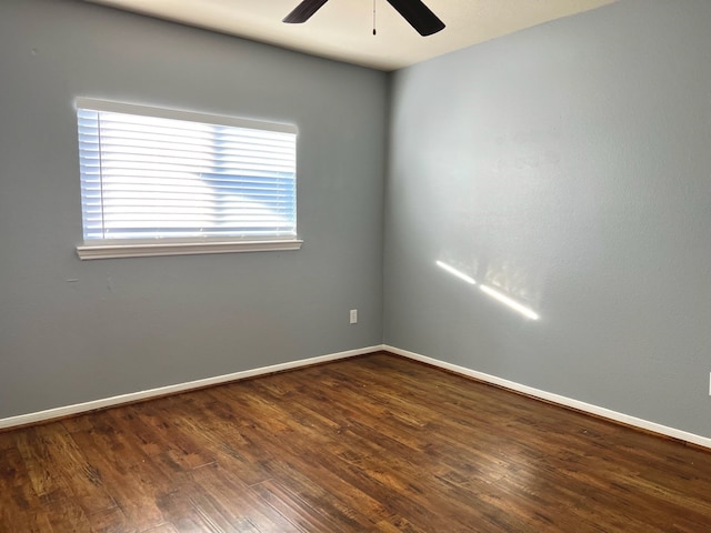 unfurnished room with hardwood / wood-style flooring and ceiling fan