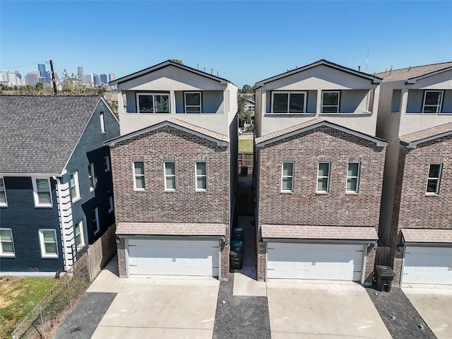 front facade with a garage