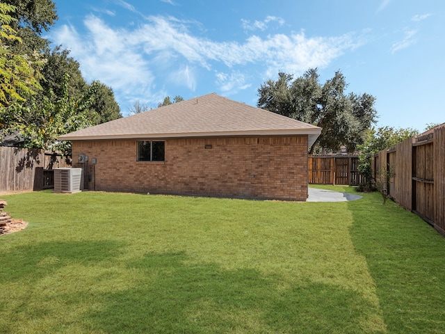 exterior space with central air condition unit and a patio