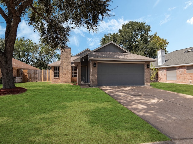 ranch-style home featuring a garage and a front yard