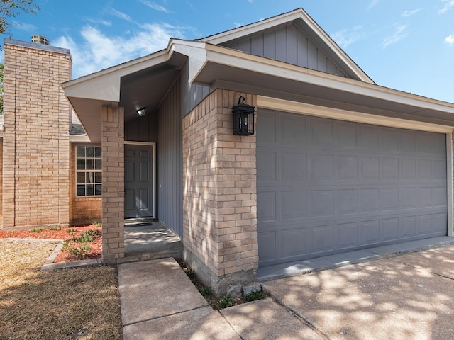 property entrance with a garage