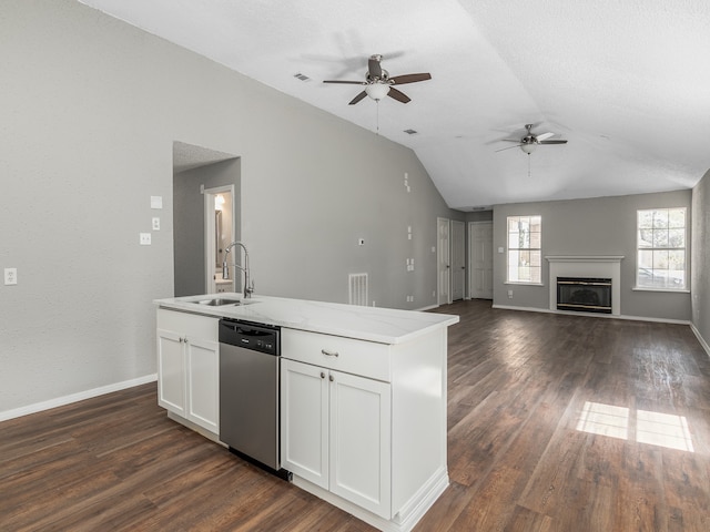 kitchen featuring lofted ceiling, dishwasher, white cabinets, sink, and dark hardwood / wood-style floors