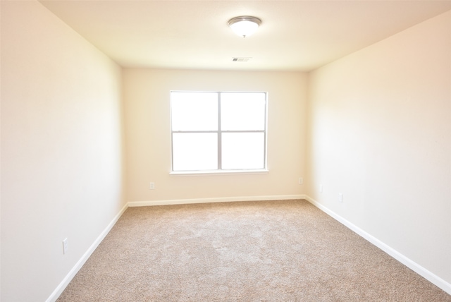 empty room with carpet flooring