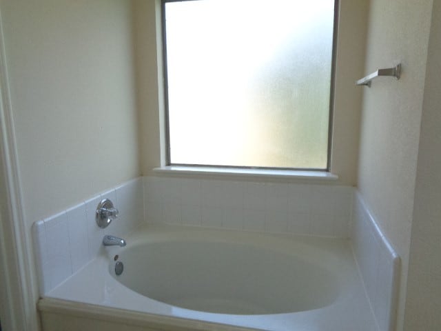 bathroom with a bath