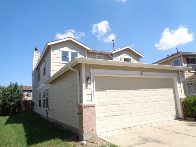 view of front of home featuring a garage