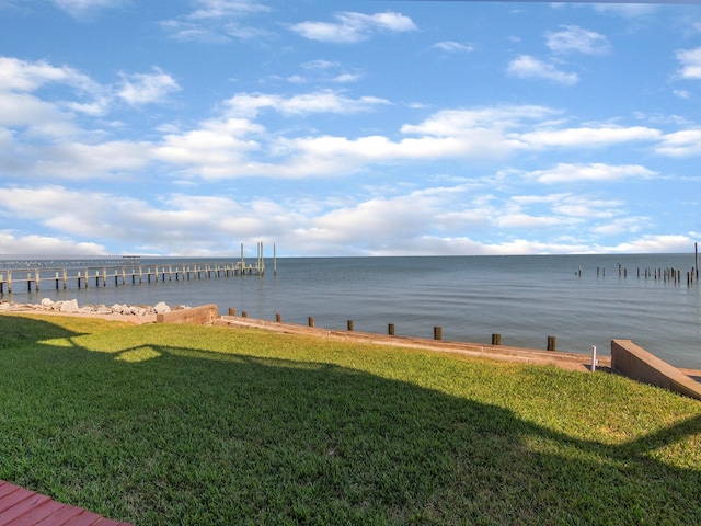 view of water feature with a dock