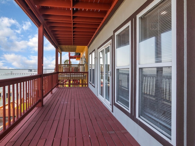 deck featuring french doors and a water view