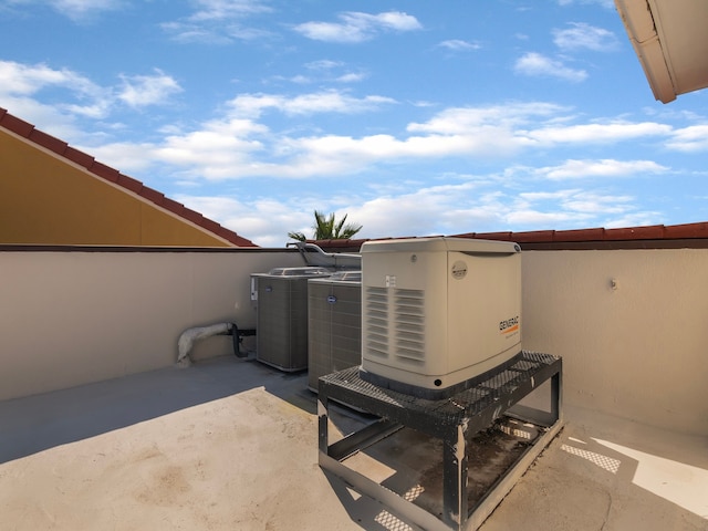 exterior details with concrete flooring and central AC unit