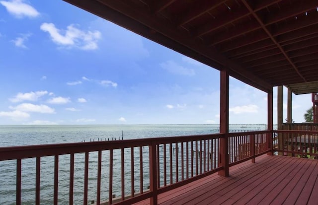 wooden terrace with a water view