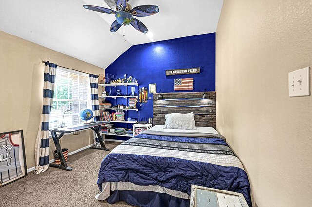 carpeted bedroom featuring lofted ceiling and ceiling fan