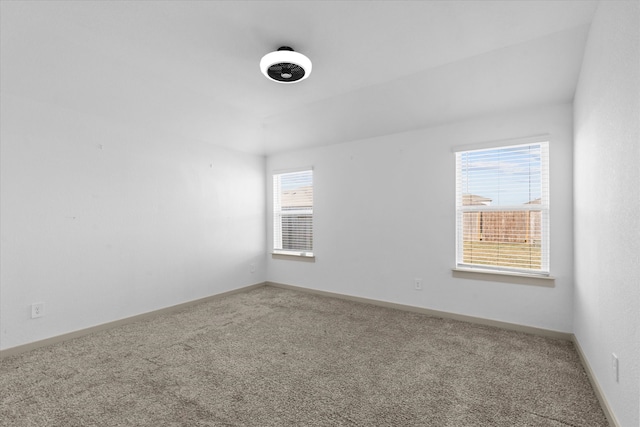 unfurnished room featuring carpet floors