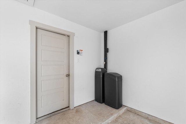 interior space with unfinished concrete flooring