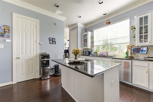 kitchen featuring decorative backsplash, white cabinetry, dishwasher, and dark wood-type flooring