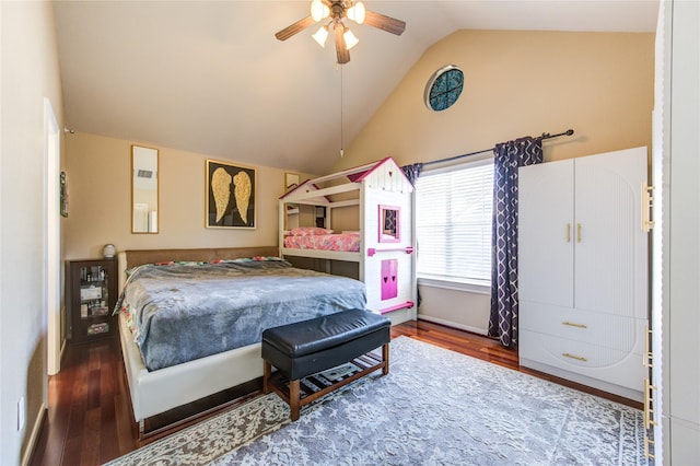 bedroom featuring vaulted ceiling, wood finished floors, and a ceiling fan