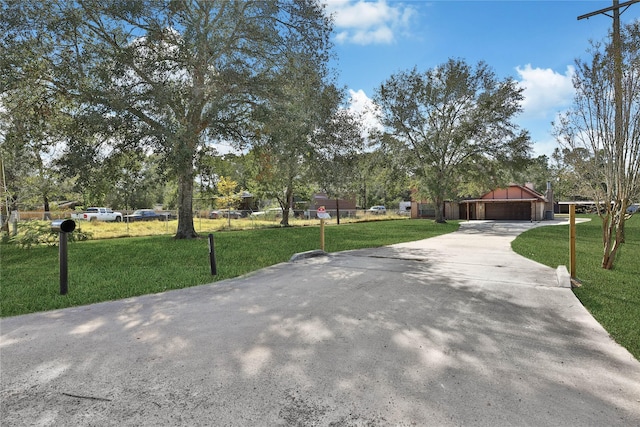 exterior space featuring a front yard and a garage