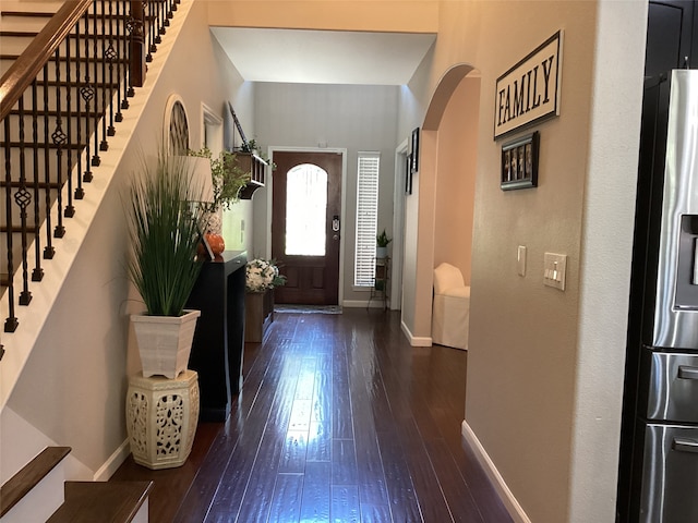 entryway featuring dark wood-type flooring