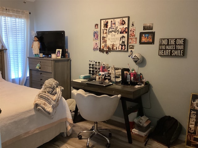 bedroom featuring hardwood / wood-style flooring