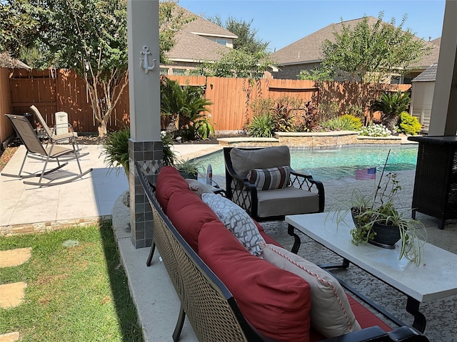 view of patio / terrace with an outdoor living space, a fenced in pool, and pool water feature