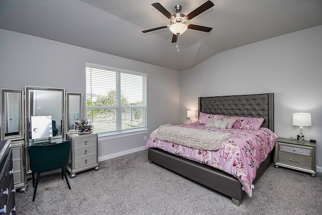 bedroom with lofted ceiling, carpet flooring, and ceiling fan