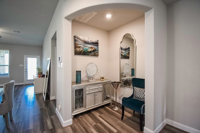 hall with dark wood-type flooring