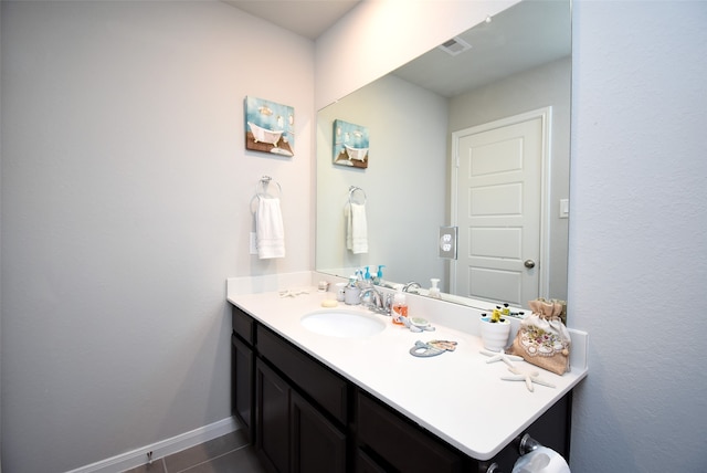 bathroom with vanity and tile patterned floors