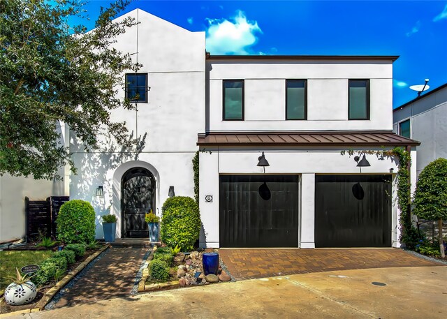 view of front of home featuring a garage