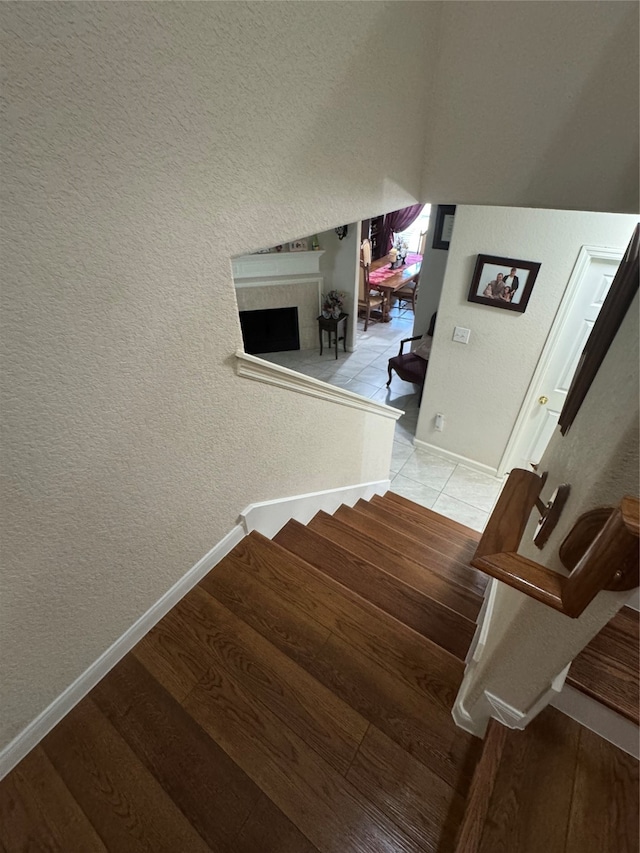 staircase featuring hardwood / wood-style floors