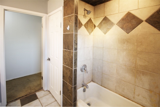 bathroom featuring tile patterned flooring and tiled shower / bath combo