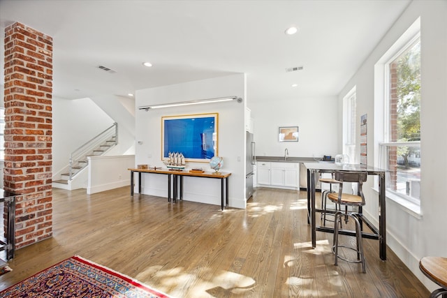 interior space with sink and light wood-type flooring