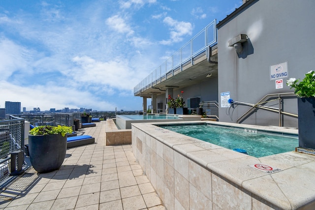 view of pool with a patio