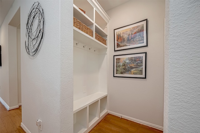 mudroom featuring wood-type flooring